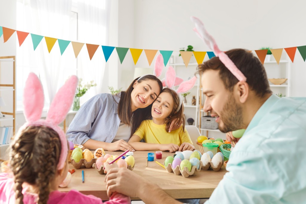 Happy Family Spending time on colouring crafts